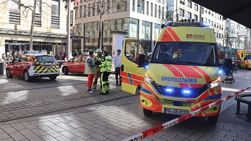 Emergency services and police stand at Paradeplatz in Mannheim, 3 March 2025