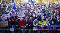 People gather to take part at a protest called "Slovakia is Europe" in Bratislava Friday, March 7, 2025