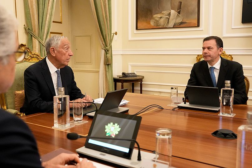 Portuguese President Marcelo Rebelo de Sousa, left, speaks with Prime Minister Luís Montenegro during a meeting of the council of state in Lisbon, 13 March, 2025