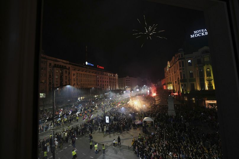 People welcome protesters from provinces who have arrived ahead of a major rally this weekend in downtown Belgrade, Serbia, Friday, March 14, 2025