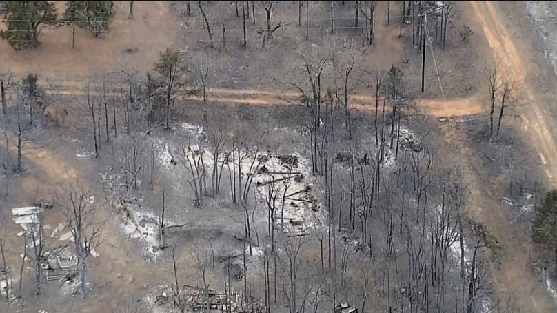 This image provided by shows aerials over the damage caused by the wildfires in Logan County, Oklahoma