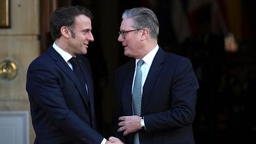 Britain's Prime Minister Keir Starmer, right, greets French President Emmanuel Macron as he arrives for a summit on Ukraine at Lancaster House in London, March 2, 2025 Britain's Prime Minister Keir Starmer, right, greets French President Emmanuel Macron as he arrives for a summit on Ukraine at Lancaster House in London, March 2, 2025