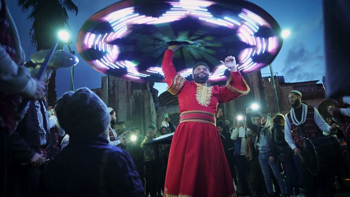 Watch: Syrian troupe sings, spins and lifts spirits in Ramadan