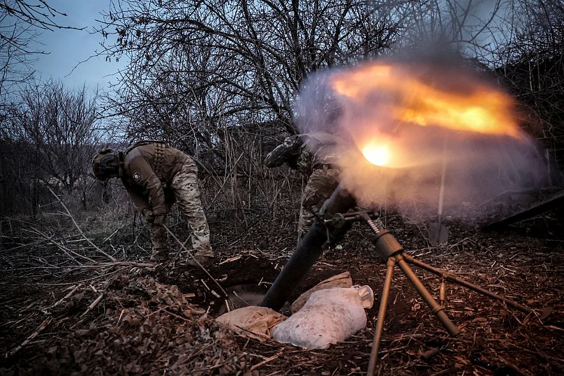 Ukrainian soldiers fire 120mm mortar towards Russian army positions near Chasiv Yar, 16 March, 2025