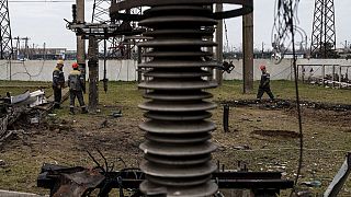 Workers of DTEK company work on a site of a substation destroyed by a Russian drone strike in undisclosed location, Ukraine, March 25, 2025