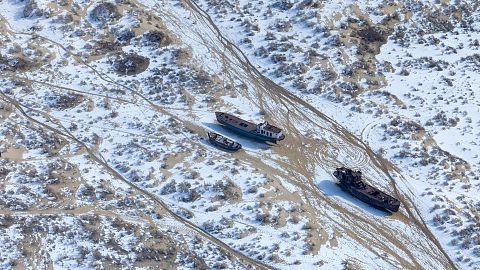Boats marooned in Moynaq. 