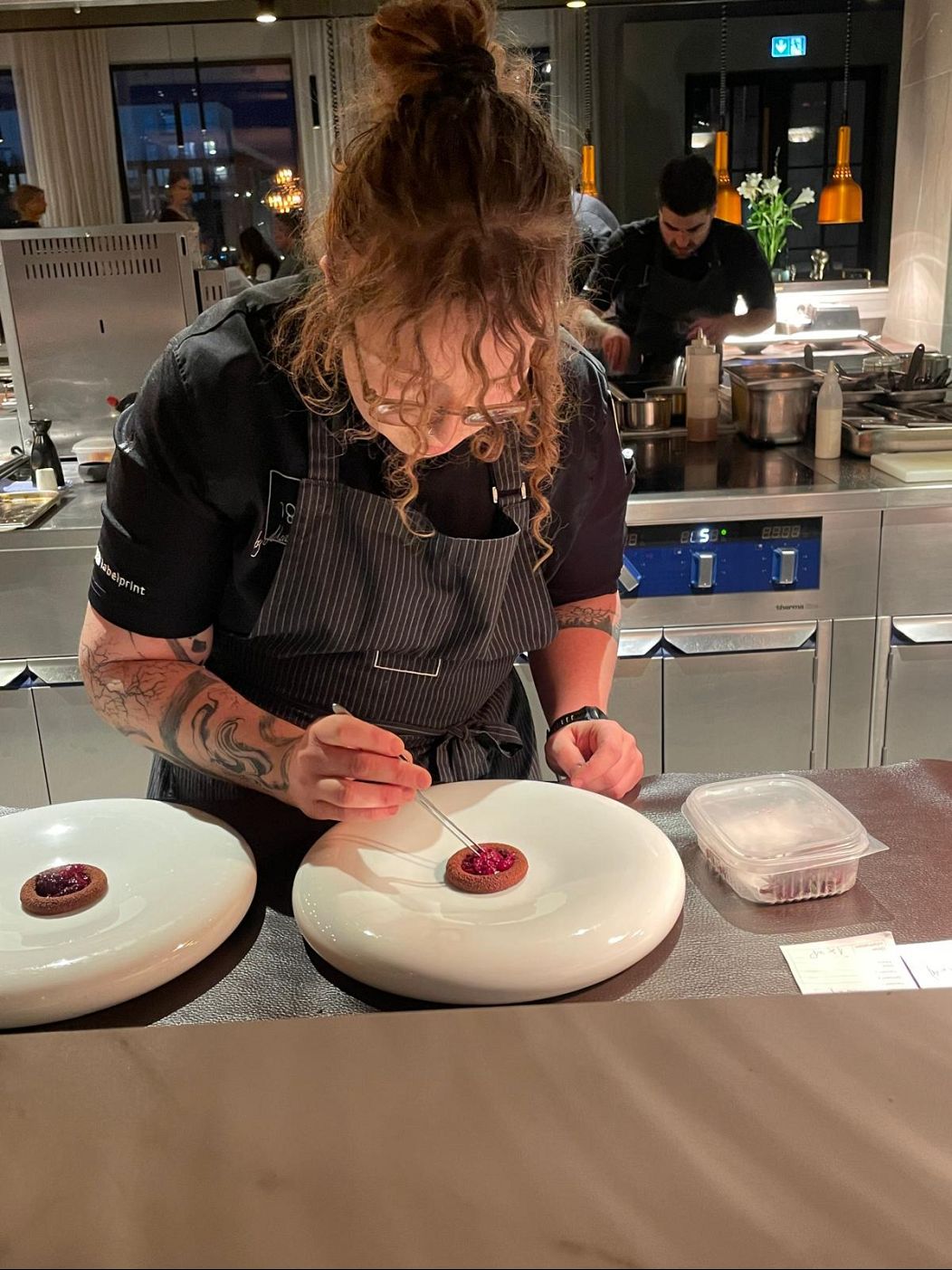 Lisa prepares the chocolate and cherry dessert
