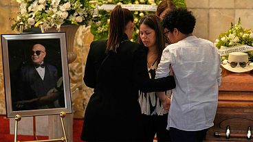 Mourners pay tribute to merengue icon Rubby Pérez, who died in the Dominican Republic roof collapse