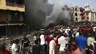 Roadside bomb kills 8 bus passengers in northeast Nigeria