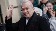 Jean Paul Gaultier poses for photographers upon arrival at the Vivienne Westwood Fall/Winter 2023-2024 ready-to-wear collection presented on 4 March 2023 in Paris.