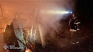 Firefighters put out the fire at private houses following a Russian guided air bomb attack in Kherson, 15 March, 2025
