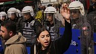 A woman shouts slogans during a protest outside Caglayan courthouse, in Istanbul, Turkey, Friday, April 18, 2025, during the hearing of dozens of people