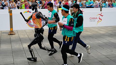 A robot takes part in what is billed as the world's first robot half marathon during the Humanoid Robot Half-Marathon held in Beijing on Saturday, April 19, 2025. 