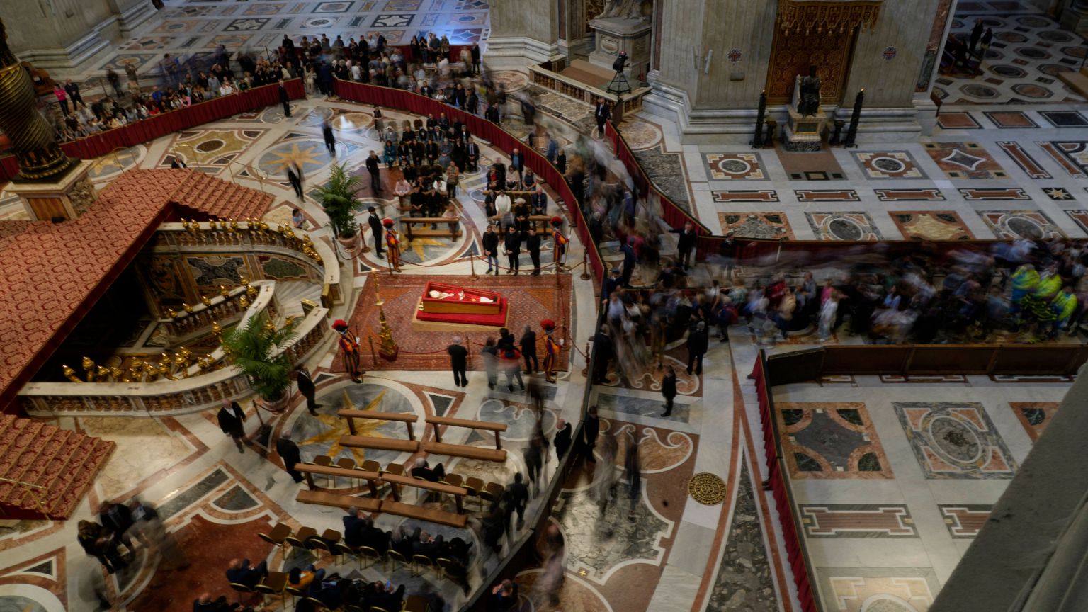 People pay their respect to the late Pope Francis who will lie in state inside St Peter's Basilica until Friday, 24 April, 2025