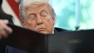 US President Donald Trump signing an executive order