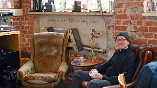 Enjoying a cup of Helsinki Coffee Roastery’s coffee at Päiväkahvibaari café. 