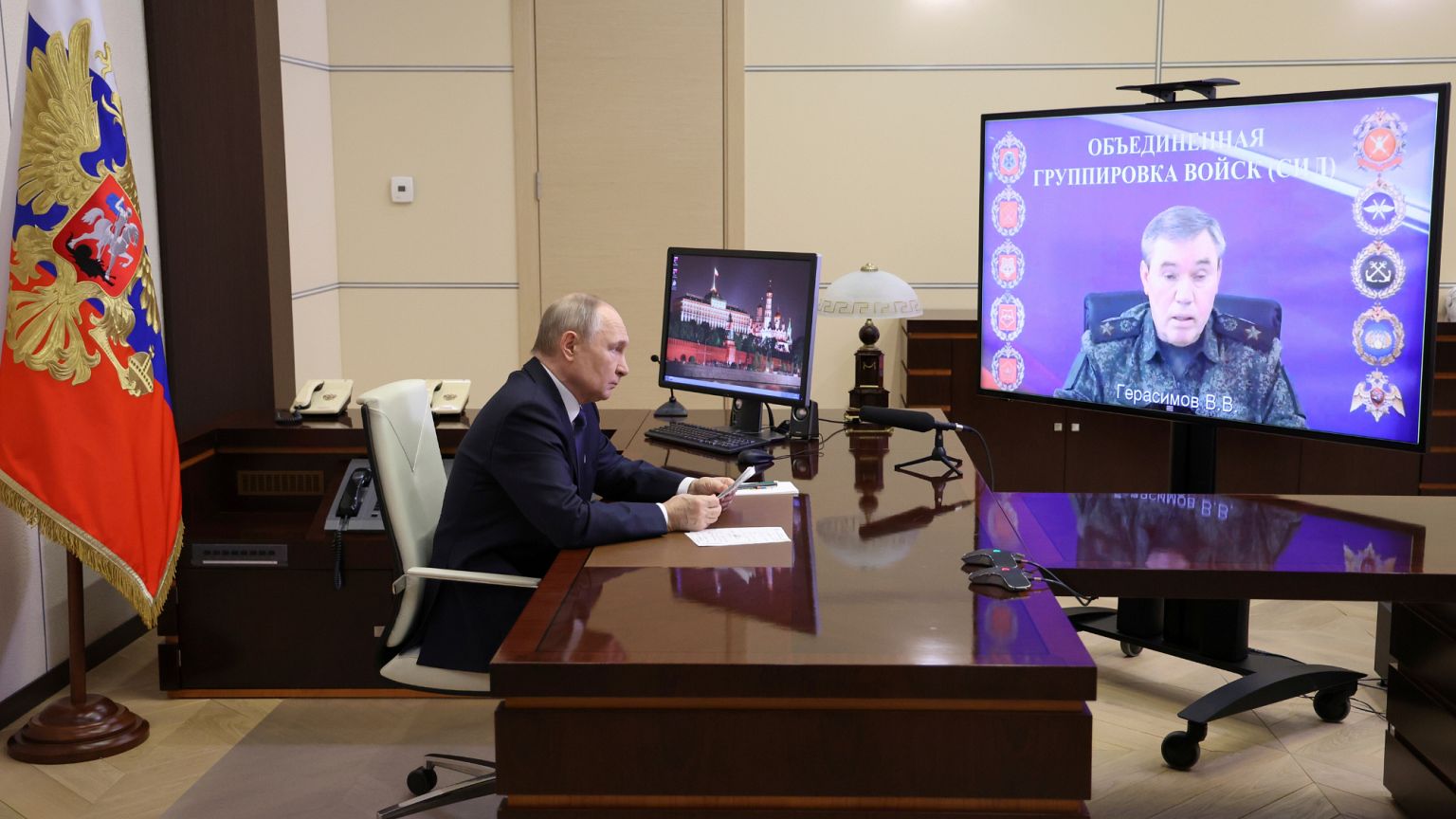 Russian President Vladimir Putin listens to Russian Chief of General Staff Gen. Valery Gerasimov saying that Ukrainian troops have been forced from Kursk, April 26, 2025. 