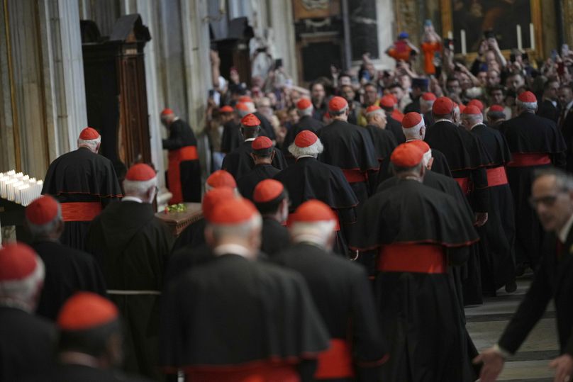 Cardinals leave the Papal Basilica of Saint Mary Major, where the late Pope Francis was buried, in Rome, 27 April 2025
