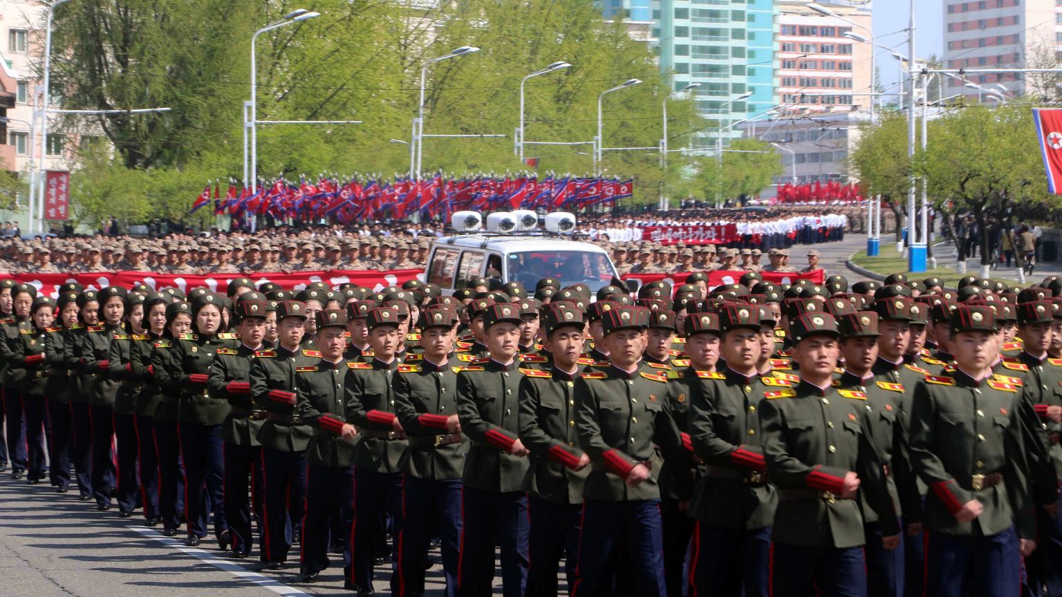 Students of revolutionary schools participate in a commemorative march in the street of Arch of Triumph in Pyongyang, 25 April 2025