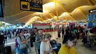 Passengers in the queue at Madrid airport