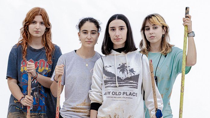 A portrait of solidarity: Raúl Belinchón’s stunning images of mud-covered volunteers in Spain