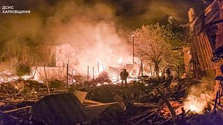 Kharkiv firefighters extinguish a fire after a Russian drone attack on residential buildings, 30 April 2025.