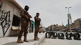 Syrian government security forces stand guard on their checkpointat one of Jaramana suburb entrances, in the southern suburb of Jaramana, Damascus, Syria, 30.04.2025