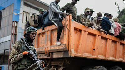 Red Cross escorts hundreds of stranded Congolese soldiers from rebel-controlled city to capital