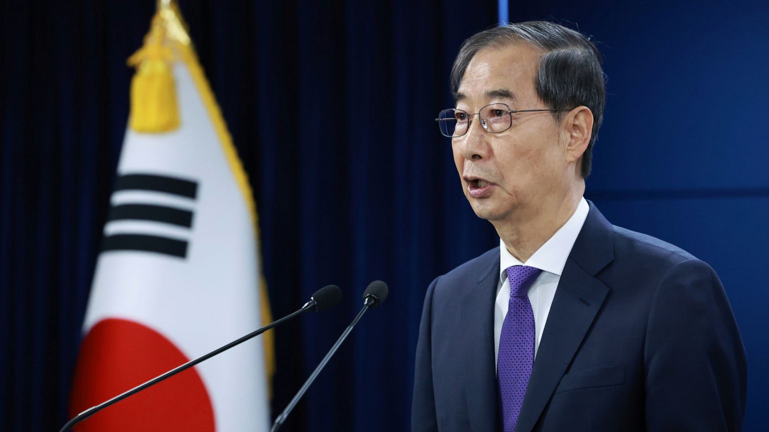 South Korean acting President Han Duck-soo speaks during a press conference at the Government Complex in Seoul, South Korea, Thursday, May 1, 2025.