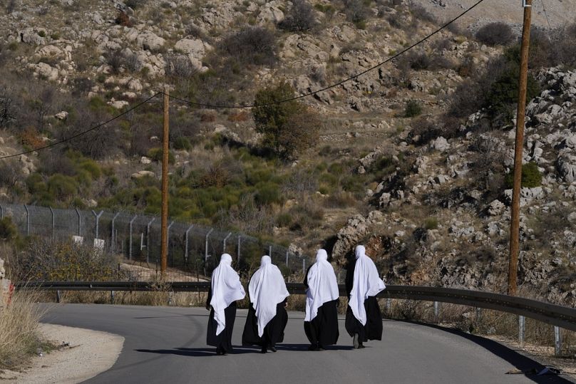 نساء درزيات في قرية مجدل شمس يوم الأحد، 15 ديسمبر 2024.