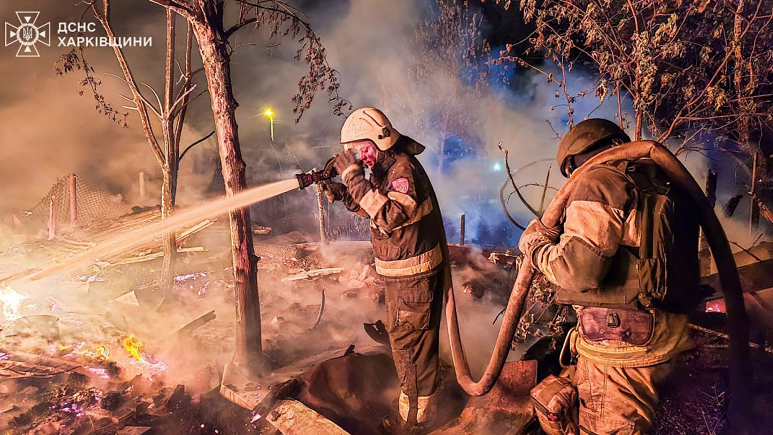 Firefighters put out a fire following a Russian drone attack that hit apartment buildings in Kharkiv, Ukraine, Wednesday, April 30, 2025. 