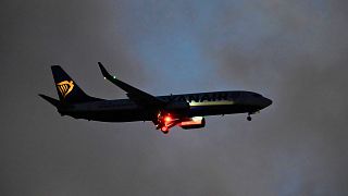 A Ryanair airplane approaches for landing in Lisbon, 28 September 2022. 
