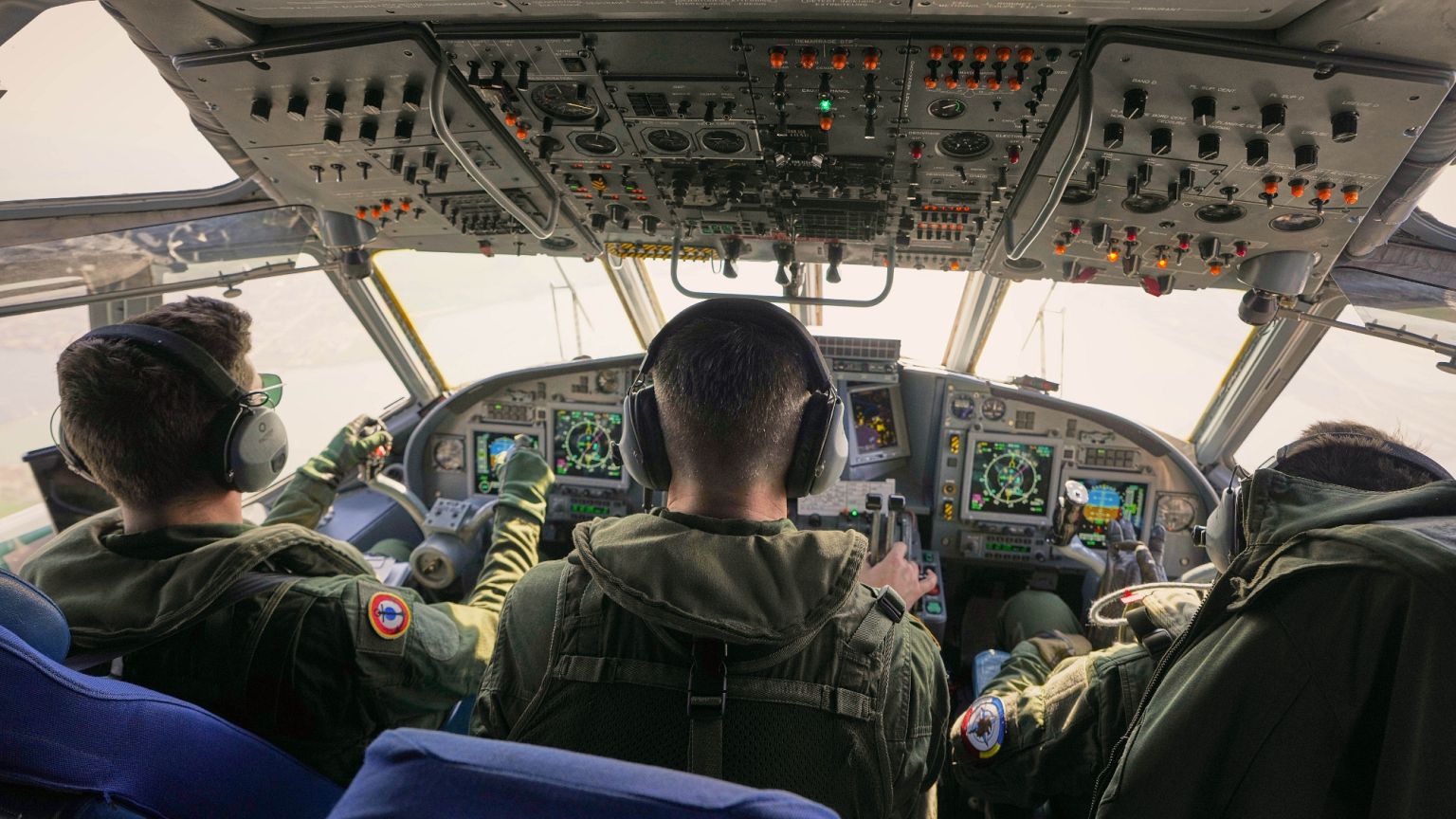 Crew members fly a French Navy Atlantique-2 submarine hunter naval airplane during a NATO military exercise in Romania, 9 April, 2025