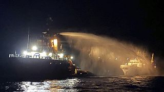 A firefighting tug boat contacted by the Malta Vessel Traffic Services (VTS) helps control a fire on the Conscience aid vessel, 2 May, 2025 