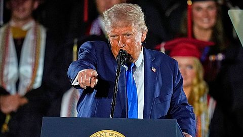 US Democrats governors defiant in face of lawsuits from Donald Trump seeking to stop climate action.