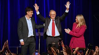 Australian Prime Minister Anthony Albanese, his partner Jodie Haydon and son Nathan react after winning a second term after the election in Sydney, Saturday, May 3, 2025