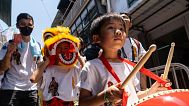 FILE PHOTO - Participants take part in the Piu Sik Parade at the Bun Festival in Cheung Chau Island in Hong Kong, Wednesday, May 15, 2024. 