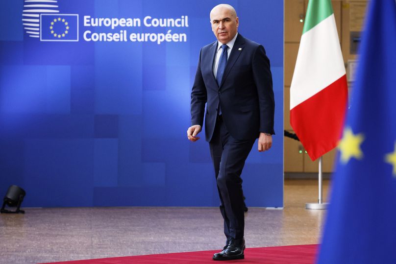 Il presidente rumeno a interim Ilie Bolojan arriva al vertice dell'Ue, Bruxelles, 20 marzo 2025