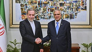 Iran's Foreign Minister Abbas Araghch shakes hand with his Pakistan's Foreign Minister Ishaq Dar prior to their meeting in Islamabad, Pakistan, Monday, May 5, 2025