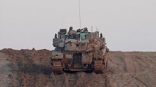 An israeli army vehicle is seen near the Israeli-Gaza border, 1 January 2025