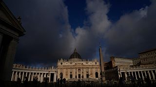 On the eve of the conclave, tourists and locals in Rome wait in suspense