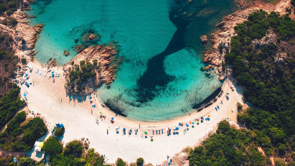 Limestone pinnacles, cypress trees and white cliffs: 4 European beaches among the best in the world