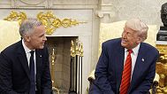 Canada Prime Minister Mark Carney and U.S. President Donald Trump engage in a meeting at the White House in Washington, Tuesday, May 6, 2025