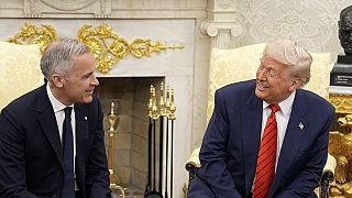 Canada Prime Minister Mark Carney and U.S. President Donald Trump engage in a meeting at the White House in Washington, Tuesday, May 6, 2025