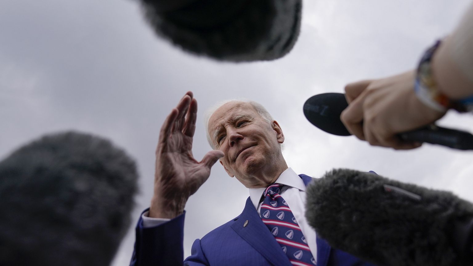 President Joe Biden talks with reporters be he boards Air Force One at Raleigh-Durham International Airport in Morrisville, 28 March, 2023