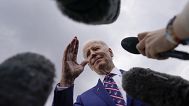 President Joe Biden talks with reporters be he boards Air Force One at Raleigh-Durham International Airport in Morrisville, 28 March, 2023