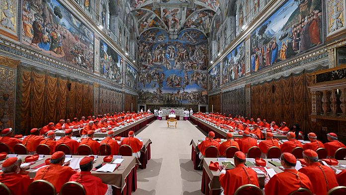 No pope elected on first day of conclave as black smoke appears above Vatican