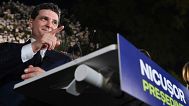 Presidential candidate Nicusor Dan gestures as he addresses supporters after polls closed for the first round of the country's presidential election redo in Bucharest.