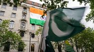 Demonstrators wave flags as they gather to protest outside the India High Commission, in London, Wednesday, May 7, 2025.