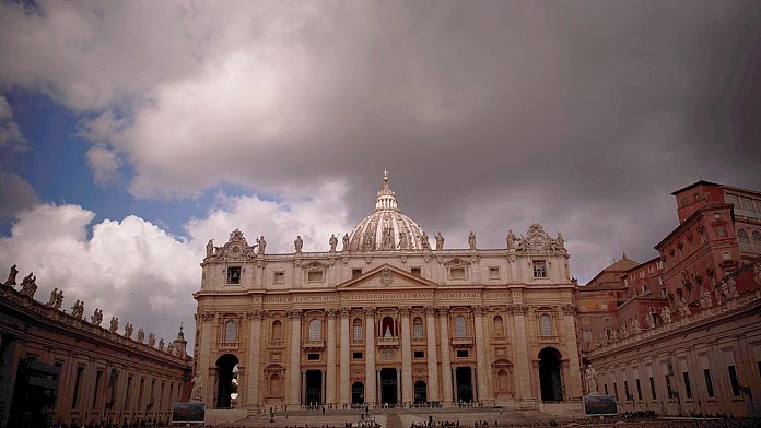 Thousands watch black smoke billow from Sistine Chapel